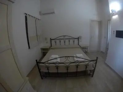Letto o letti in una camera di Agriturismo Su Meurreddu