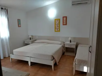 Letto o letti in una camera di Il Falconiere