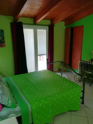 Letto o letti in una camera di B&B Le Terrazze Isola Di S. Antioco
