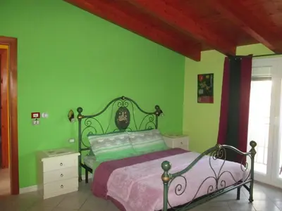 Letto o letti in una camera di B&B Le Terrazze Isola Di S. Antioco
