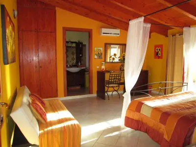 Letto o letti in una camera di B&B Le Terrazze Isola Di S. Antioco
