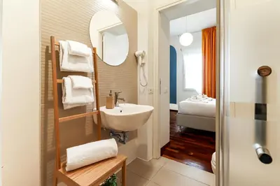 Letto o letti in una camera di B&B Qaral