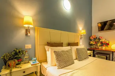 Letto o letti in una camera di Marlin Rooms