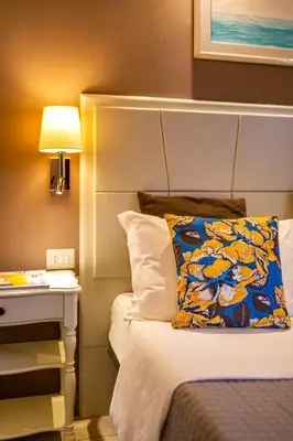 Letto o letti in una camera di Marlin Rooms