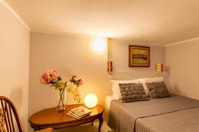 Letto o letti in una camera di Marlin Rooms
