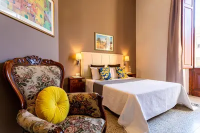 Letto o letti in una camera di Marlin Rooms