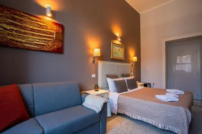 Letto o letti in una camera di Marlin Rooms