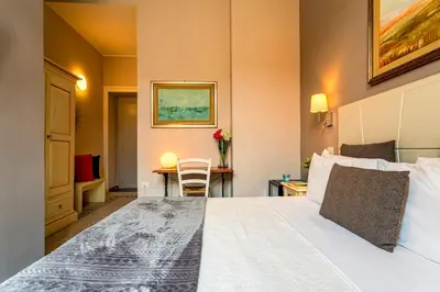 Letto o letti in una camera di Marlin Rooms