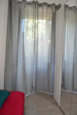 Letto o letti in una camera di Borgo Marinaro La Medusa Arbatax - camera matrimoniale con bagno privato-