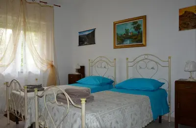 Letto o letti in una camera di Pietro & Graziella