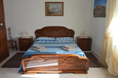Letto o letti in una camera di Pietro & Graziella