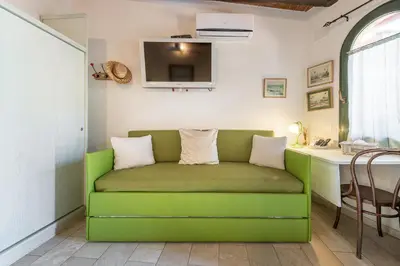 Area soggiorno di Guest House Villa Verde - Short Term Room Rentals