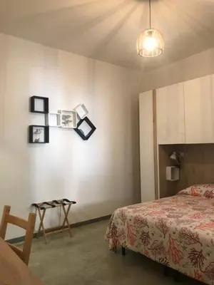Letto o letti in una camera di 40° Parallelo Guest House