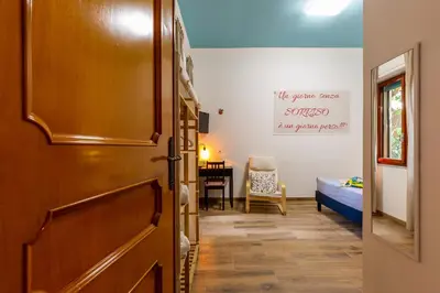 Letto o letti in una camera di Sa Babbaiola