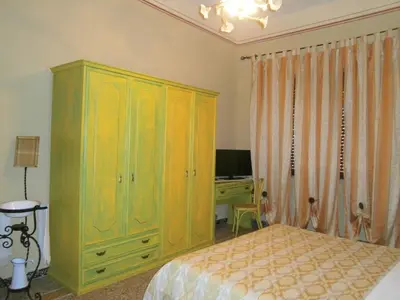 TV o dispositivi per l'intrattenimento presso Bed and Breakfast Su Niu