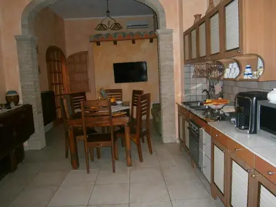 Cucina o angolo cottura di Bed and Breakfast Su Niu