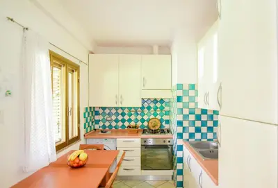 Cucina o angolo cottura di Appartamento fronte mare Perdepera