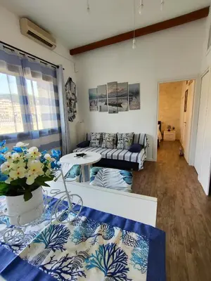 Area soggiorno di Holiday Home in Villasimius