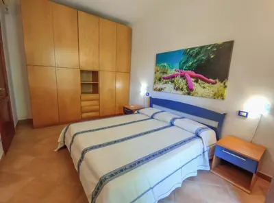 Letto o letti in una camera di Domu Cannuja