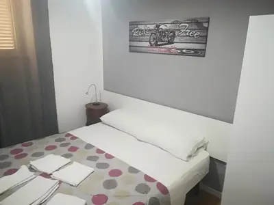 Letto o letti in una camera di Casa Bea