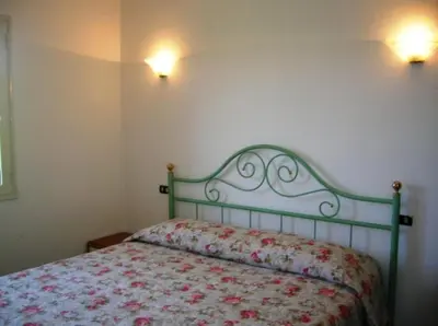 Letto o letti in una camera di Deiana's Apartment - Cardedu Beachside