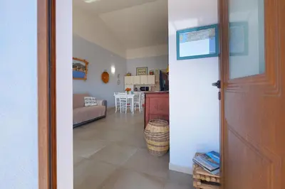 Letto o letti in una camera di CASA AZZURRA - BLUE HOUSE