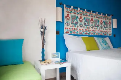 Letto o letti in una camera di Le Stanze di Patika