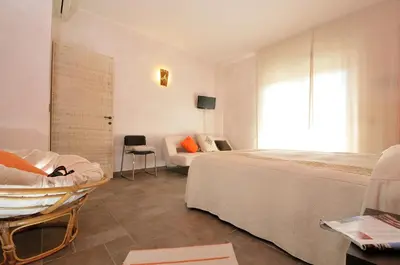 Letto o letti in una camera di Le Stanze di Patika