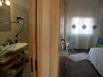 Letto o letti in una camera di Le Stanze di Patika