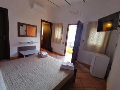 Letto o letti in una camera di Room and Breakfast I Gemelli
