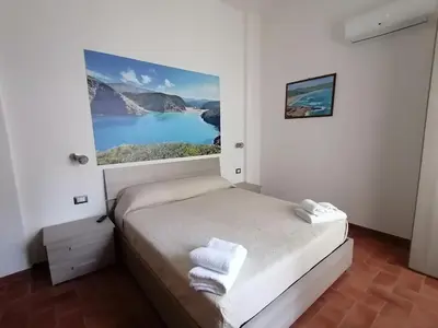 Letto o letti in una camera di Room and Breakfast I Gemelli