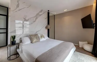 Letto o letti in una camera di Arveskida Suite Apartment