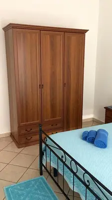 Letto o letti in una camera di CAMY Apartment Scopri Tortolì Appartamento Centrale vicino alle Spiagge!