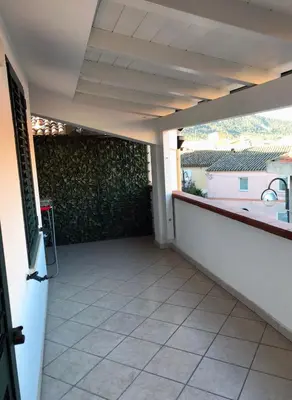 Balcone o terrazza di CAMY Apartment Scopri Tortolì Appartamento Centrale vicino alle Spiagge!