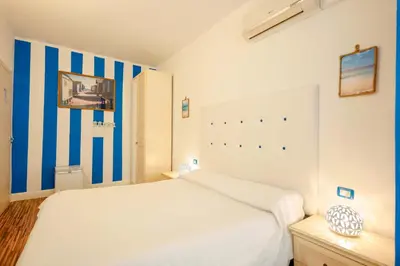Letto o letti in una camera di Villabeachcity Guesthouse
