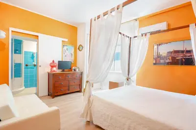 Letto o letti in una camera di Villabeachcity Guesthouse