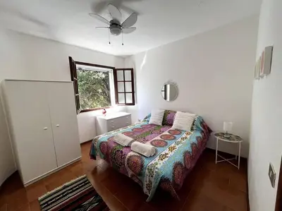 Letto o letti in una camera di Paradise Beachfront Villa, Porto Columbu, Sardinia