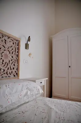 Letto o letti in una camera di Bed and Breakfast San Saturnino