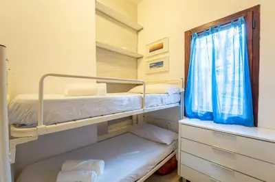 Letto o letti in una camera di Blue House, 300m to beach SouthSardiniaHolidays