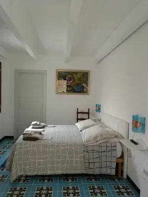 Letto o letti in una camera di Il giardino di Don Peppino