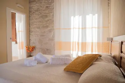 Letto o letti in una camera di Villa Chiara