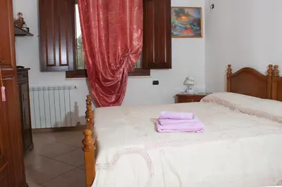 Letto o letti in una camera di Il Vecchioliveto di Ornella