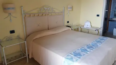 Letto o letti in una camera di Hotel Corsaro Nero