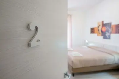 Letto o letti in una camera di Nùe Rooms
