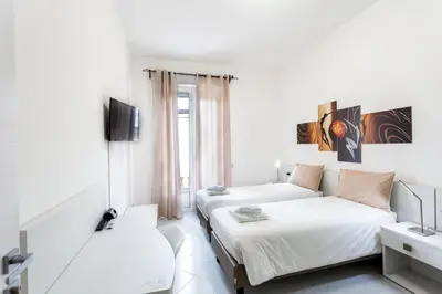 Letto o letti in una camera di Nùe Rooms