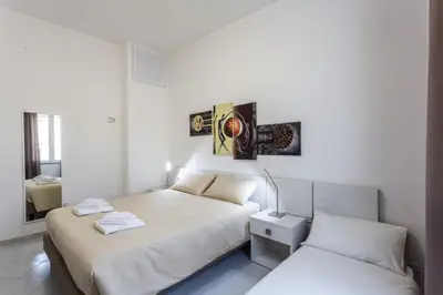 Letto o letti in una camera di Nùe Rooms