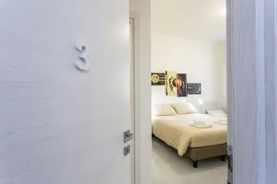Letto o letti in una camera di Nùe Rooms
