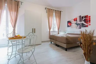 Area soggiorno di Nùe Rooms
