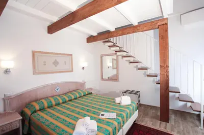 Letto o letti in una camera di Locanda degli Artisti