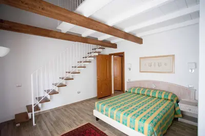 Letto o letti in una camera di Locanda degli Artisti